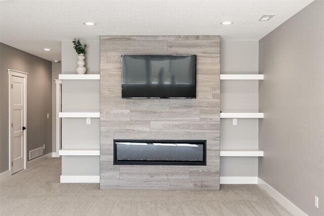 5009 148th Cir, Urbandale, IA 50323 - unfurnished living room featuring carpet, a tile fireplace, baseboards, and recessed lighting