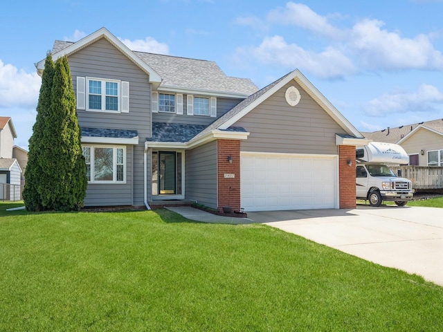 2917 SW Coves Dr, Ankeny, IA 50023 - traditional-style house with a front yard, a shingled roof, a garage, concrete driveway, and brick siding