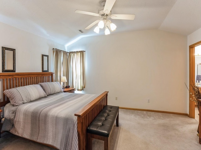 2917 SW Coves Dr, Ankeny, IA 50023 - bedroom with baseboards, visible vents, light colored carpet, and vaulted ceiling