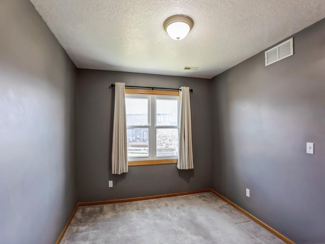2917 SW Coves Dr, Ankeny, IA 50023 - spare room with visible vents, baseboards, and carpet flooring