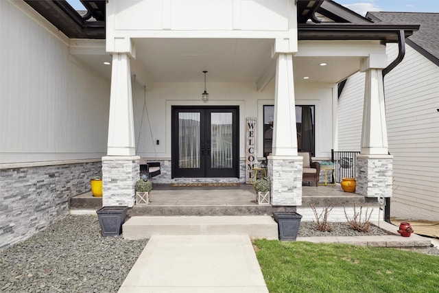 875 Roman Rd, Waukee, IA 50263 - entrance to property featuring covered porch and french doors