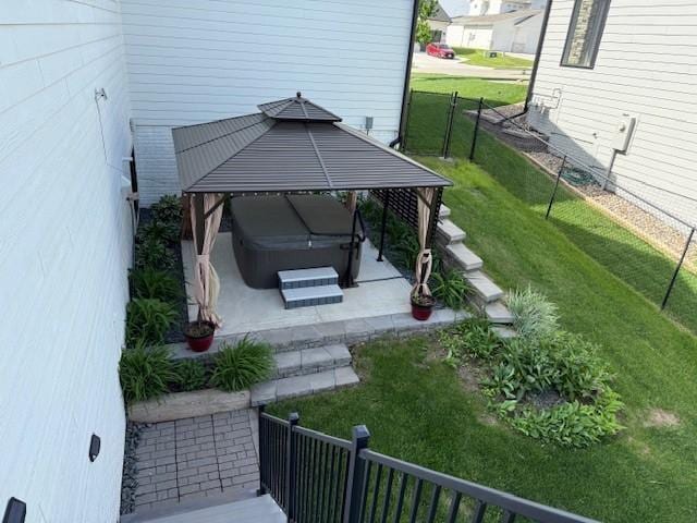 875 Roman Rd, Waukee, IA 50263 - view of yard featuring a hot tub, a gazebo, and a patio area