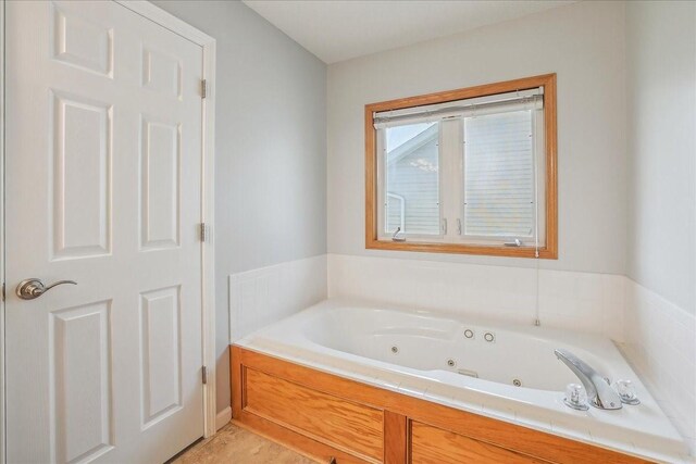 5417 NW 92nd St, Johnston, IA 50131 - bathroom with a tub with jets