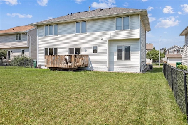 5417 NW 92nd St, Johnston, IA 50131 - back of house with a fenced backyard and a wooden deck