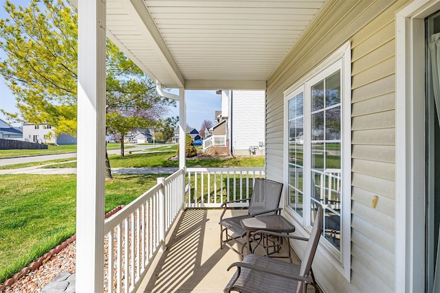 921 10th St SE, Altoona, IA 50009 - covered porch with a residential view