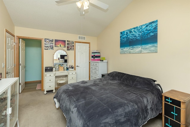 921 10th St SE, Altoona, IA 50009 - bedroom featuring lofted ceiling, light colored carpet, and ceiling fan