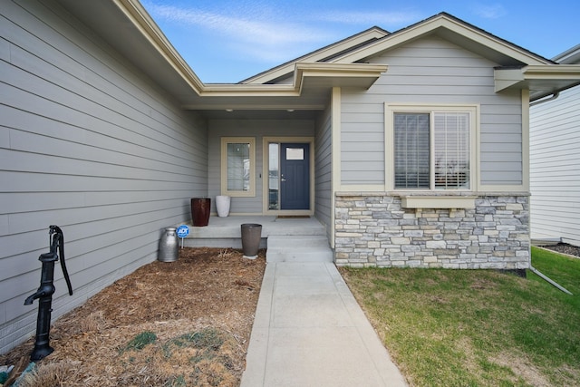 8704 Highland Oaks Dr, Johnston, IA 50131 - entrance to property featuring stone siding