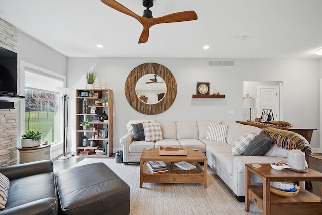 8704 Highland Oaks Dr, Johnston, IA 50131 - living room featuring a ceiling fan and recessed lighting