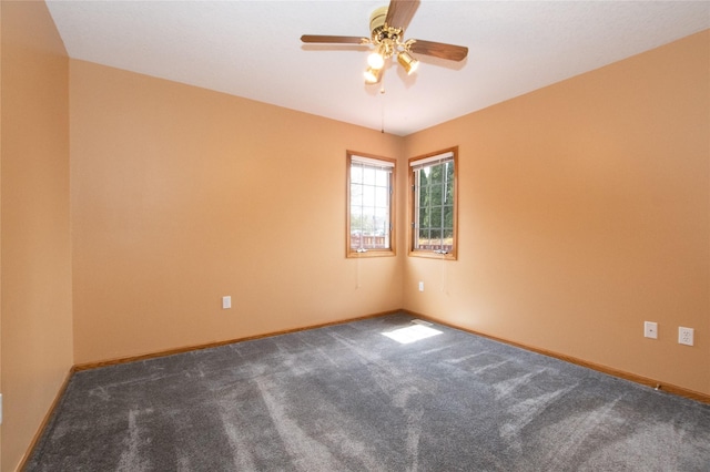 5925 Ep True Pkwy Unit 22, West Des Moines, IA 50266 - spare room with carpet floors, a ceiling fan, and baseboards