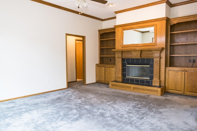 5925 Ep True Pkwy Unit 22, West Des Moines, IA 50266 - unfurnished living room with carpet flooring, crown molding, a ceiling fan, a fireplace, and baseboards
