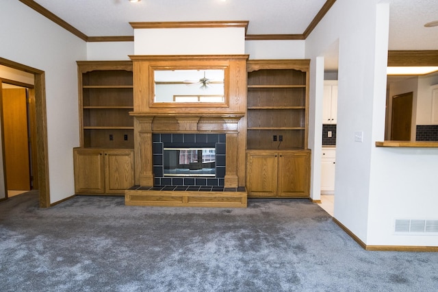 5925 Ep True Pkwy Unit 22, West Des Moines, IA 50266 - unfurnished living room with carpet floors, a tile fireplace, crown molding, and baseboards