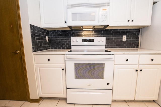 5925 Ep True Pkwy Unit 22, West Des Moines, IA 50266 - kitchen with white appliances, light tile patterned floors, light countertops, and decorative backsplash