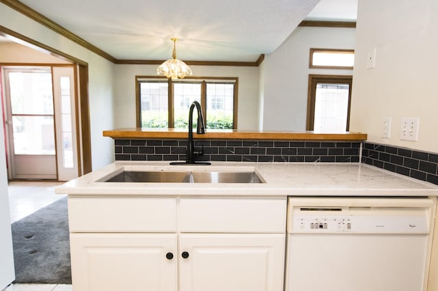 5925 Ep True Pkwy Unit 22, West Des Moines, IA 50266 - kitchen featuring dishwasher, a sink, a chandelier, crown molding, and plenty of natural light