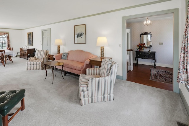 1113 Bruce Ln, Pella, IA 50219 - carpeted living room with a chandelier, visible vents, and baseboards