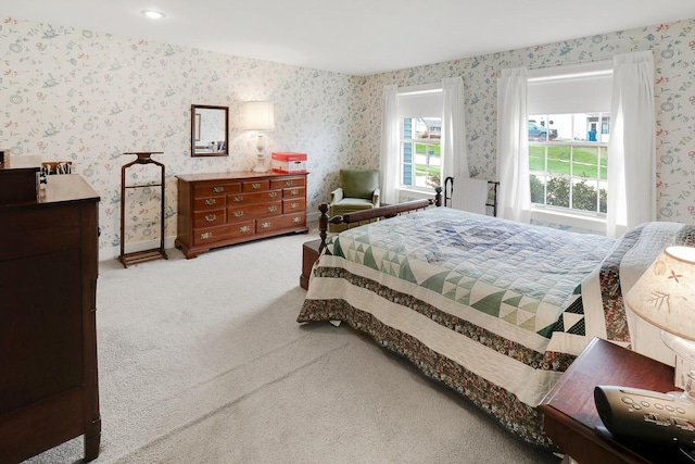 1113 Bruce Ln, Pella, IA 50219 - bedroom featuring carpet floors and wallpapered walls