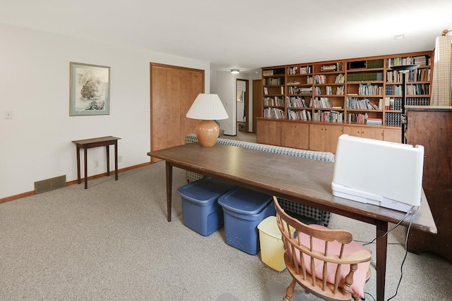 1113 Bruce Ln, Pella, IA 50219 - office space featuring baseboards, visible vents, and carpet floors