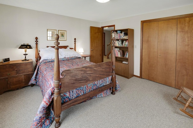 1113 Bruce Ln, Pella, IA 50219 - bedroom with a closet and light colored carpet