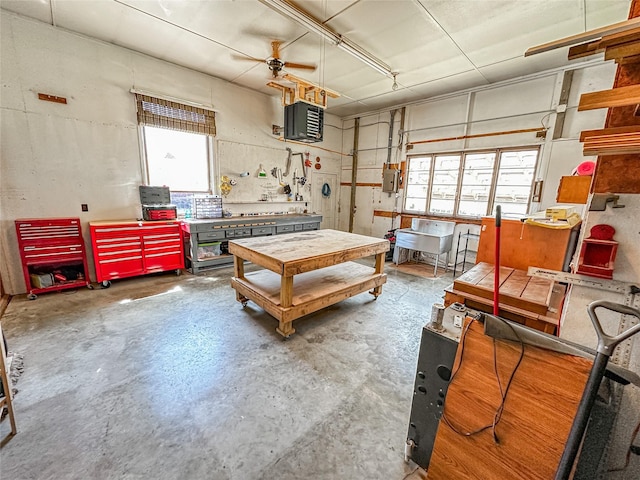 1009 198th Pl, Pella, IA 50219 - garage with a workshop area