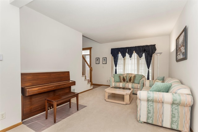 9040 Telford Cir, Johnston, IA 50131 - living area featuring carpet floors, stairs, and baseboards