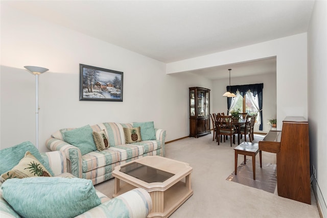 9040 Telford Cir, Johnston, IA 50131 - living area with light carpet and baseboards
