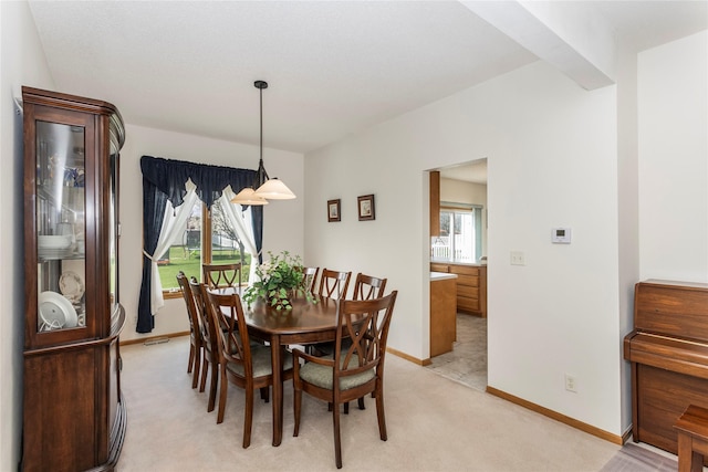 9040 Telford Cir, Johnston, IA 50131 - dining area with light colored carpet and baseboards