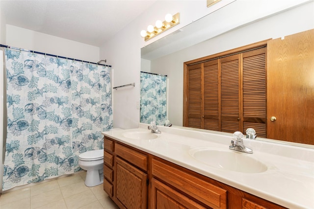 9040 Telford Cir, Johnston, IA 50131 - full bath with toilet, double vanity, tile patterned flooring, and a shower with curtain