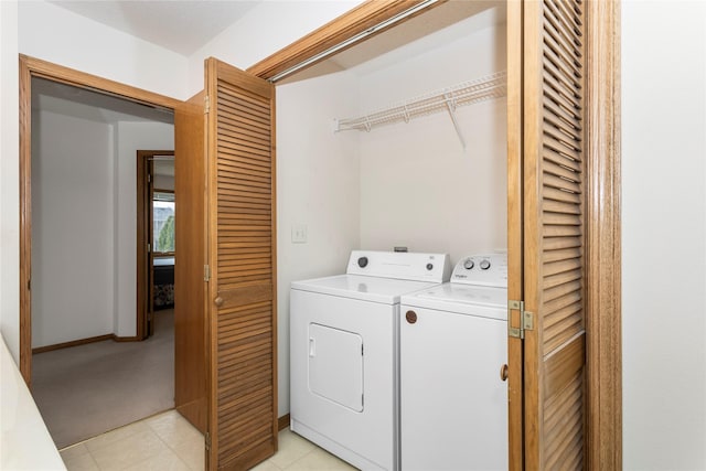 9040 Telford Cir, Johnston, IA 50131 - washroom featuring washer and dryer, light carpet, and baseboards