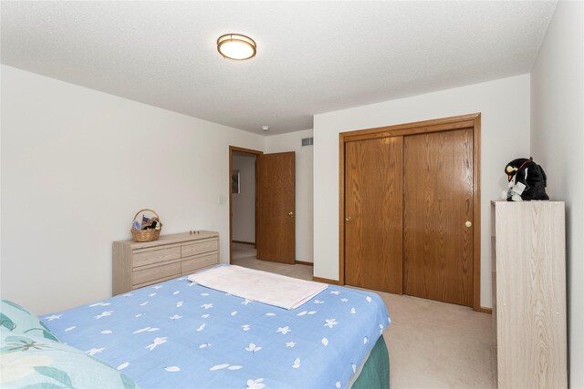 9040 Telford Cir, Johnston, IA 50131 - bedroom featuring a closet and light colored carpet