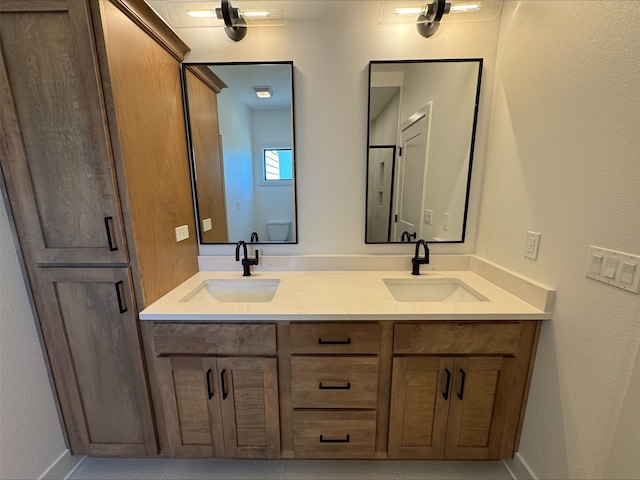 1112 2nd St NE, Altoona, IA 50009 - full bath featuring double vanity and baseboards