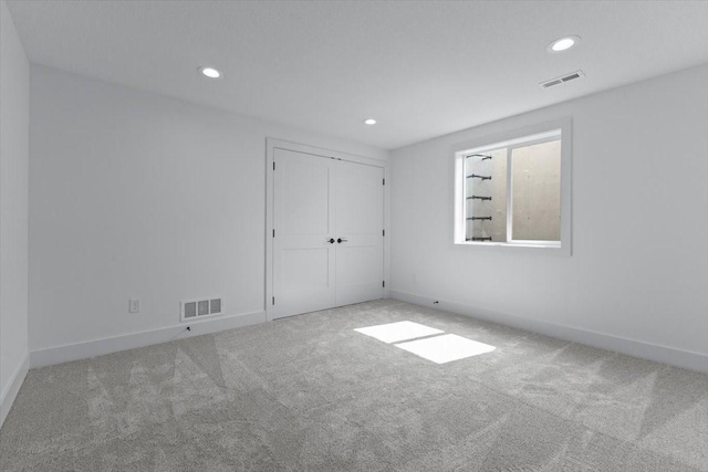1112 2nd St NE, Altoona, IA 50009 - unfurnished bedroom with carpet flooring, recessed lighting, baseboards, and a closet