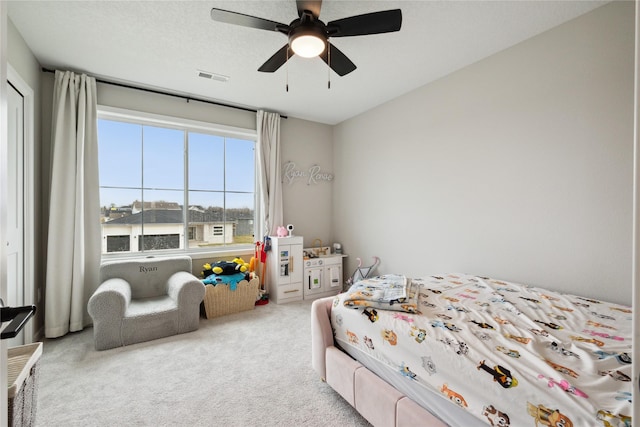 70 NW Hidden Knl, Waukee, IA 50263 - carpeted bedroom featuring ceiling fan