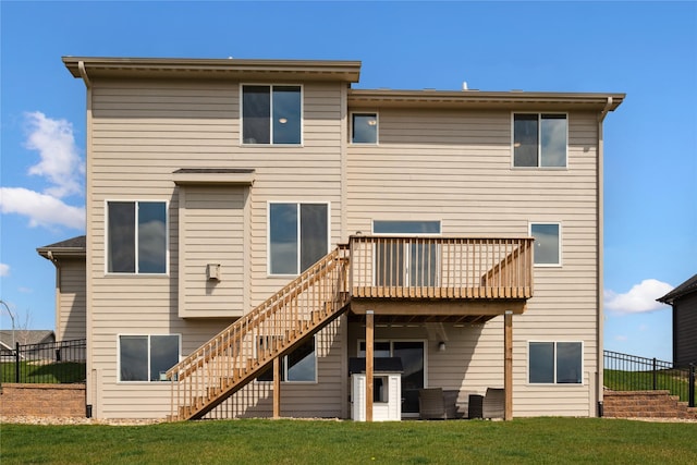 70 NW Hidden Knl, Waukee, IA 50263 - back of property with stairs and a wooden deck