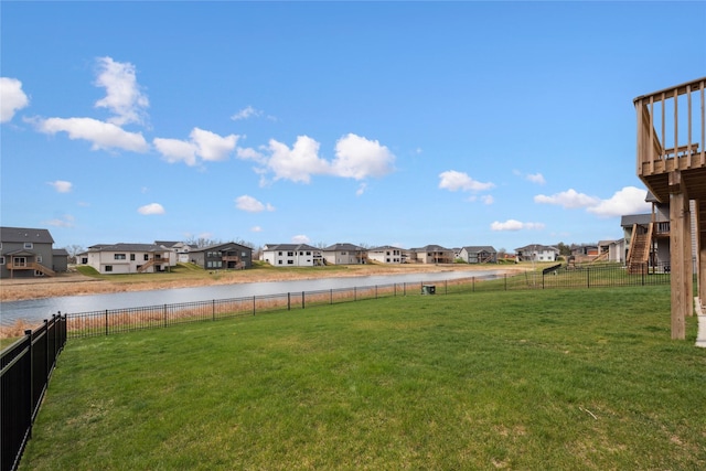 70 NW Hidden Knl, Waukee, IA 50263 - view of yard featuring a residential view and a water view