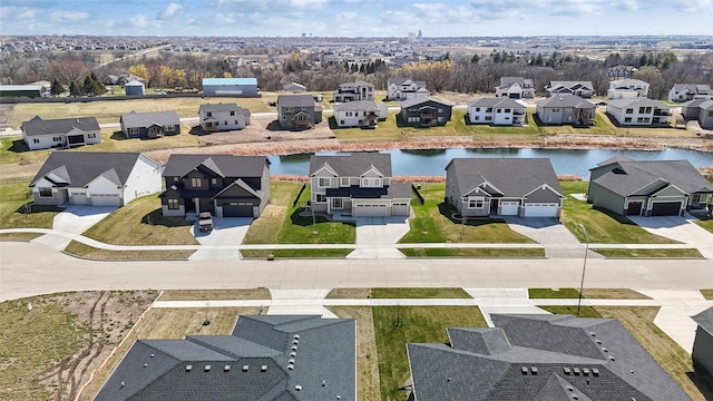 70 NW Hidden Knl, Waukee, IA 50263 - aerial perspective of suburban area featuring a nearby body of water