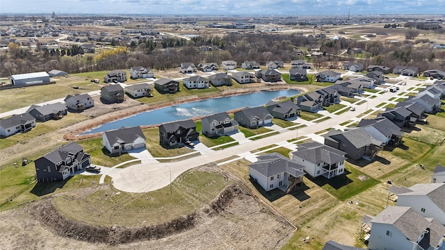 70 NW Hidden Knl, Waukee, IA 50263 - aerial view of property's location with nearby suburban area and a nearby body of water