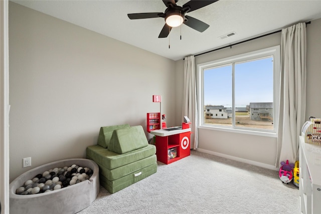 70 NW Hidden Knl, Waukee, IA 50263 - game room with carpet flooring, ceiling fan, and baseboards