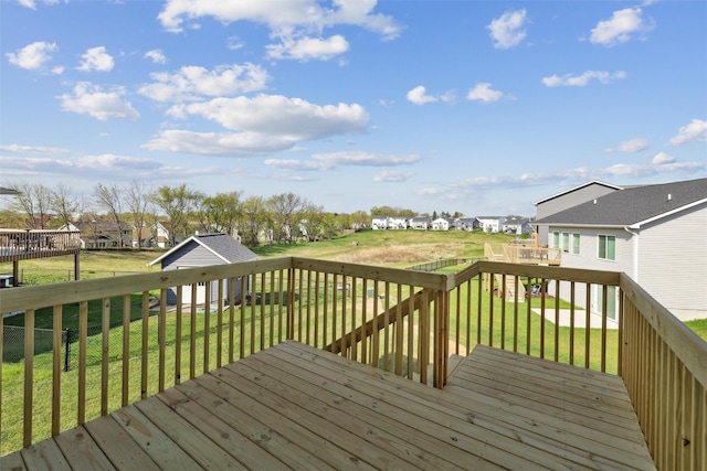 1715 Willow Ct, Norwalk, IA 50211 - wooden deck with a residential view and a lawn