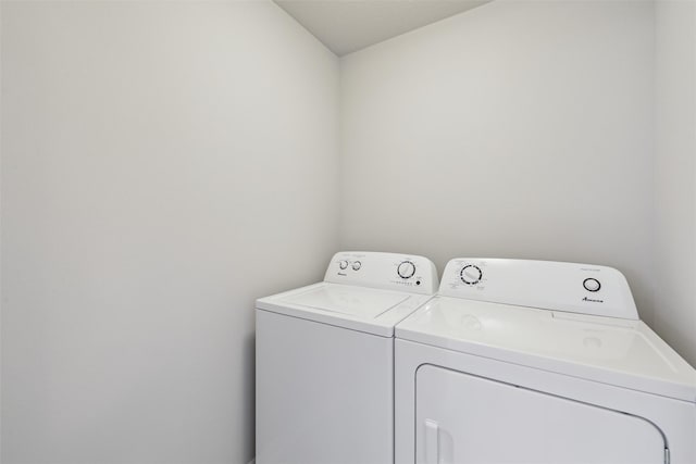 1715 Willow Ct, Norwalk, IA 50211 - laundry room featuring washing machine and dryer and laundry area
