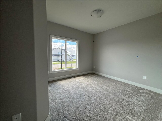 1910 Silver Maple Dr, Norwalk, IA 50211 - unfurnished room featuring carpet flooring and baseboards