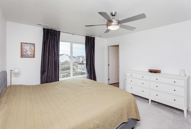 4125 NE 6th St, Ankeny, IA 50021 - bedroom featuring visible vents, ceiling fan, and light carpet