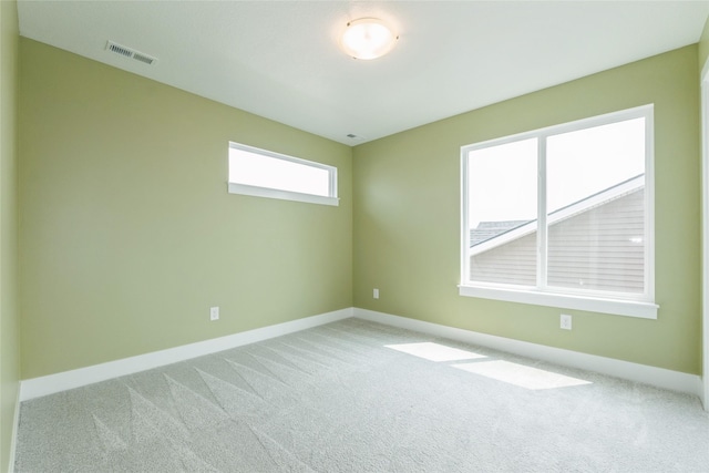 4125 NE 6th St, Ankeny, IA 50021 - empty room featuring baseboards and light carpet