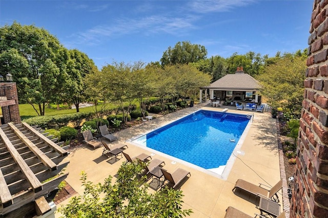 7580 NW 100th St, Johnston, IA 50131 - swimming pool featuring a gazebo and a patio area