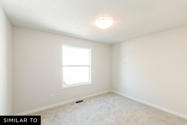 4201 NE 5th St, Ankeny, IA 50021 - carpeted empty room with visible vents and baseboards