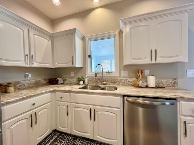2501 Ridgewood Dr, West Des Moines, IA 50265 - kitchen featuring stainless steel dishwasher, white cabinetry, a sink, and recessed lighting