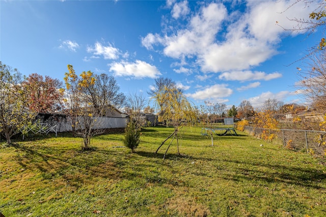view of yard with fence