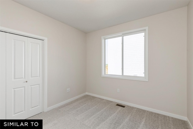 4215 NE 3rd St, Ankeny, IA 50021 - empty room with light carpet and baseboards