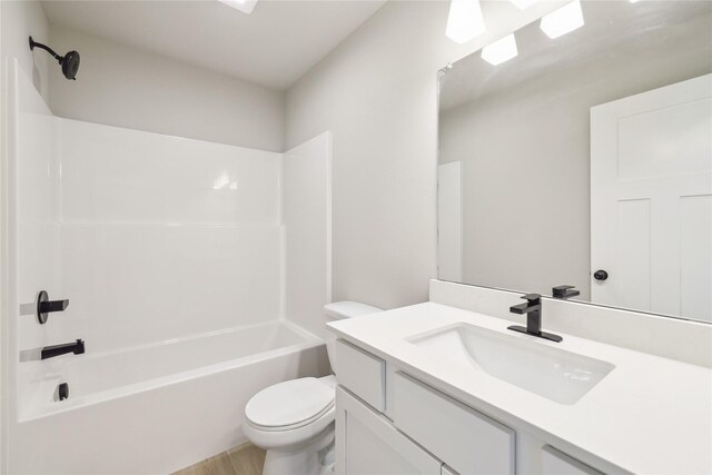 4421 NW Olivia Ln, Ankeny, IA 50023 - full bathroom with toilet, vanity, bathtub / shower combination, and wood finished floors