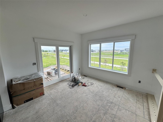 850 NW Frescott Cir, Waukee, IA 50263 - unfurnished room featuring baseboards