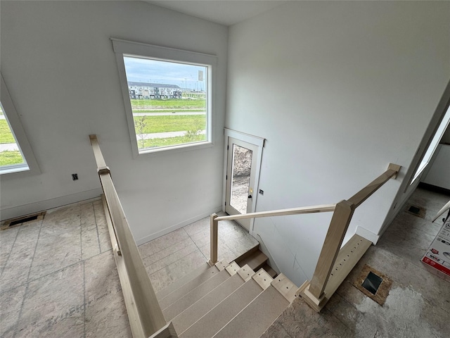 850 NW Frescott Cir, Waukee, IA 50263 - staircase with baseboards