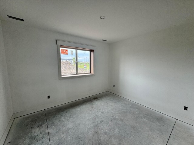 850 NW Frescott Cir, Waukee, IA 50263 - spare room with unfinished concrete flooring and baseboards